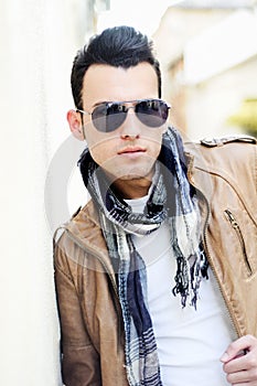 Attractive man with tinted sunglasses