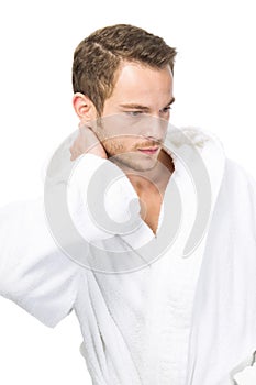 Attractive masculinity in bathrobe - isolated