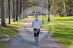 Attractive mature woman taking her daily jog