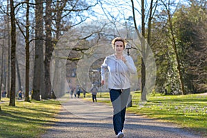 Attractive mature woman taking her daily jog