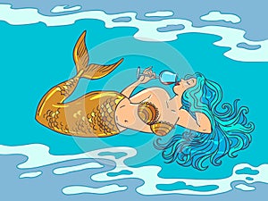 An attractive mermaid with a golden tail and sea-colored hair is drinking wine. Expensive drink and business prestige.