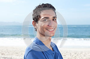 Attractive mexican guy at beach