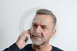 Attractive middle age man with cell phone