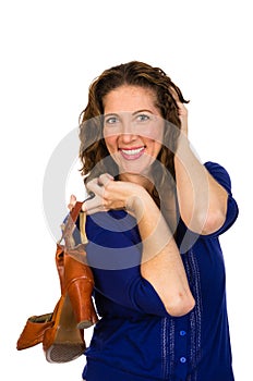 Attractive middle aged woman in blue blouse with shoes