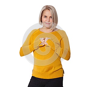 Attractive Middle Aged Woman expresses anger and conflict. Woman shows clenched fists and hatred, clenched teeth