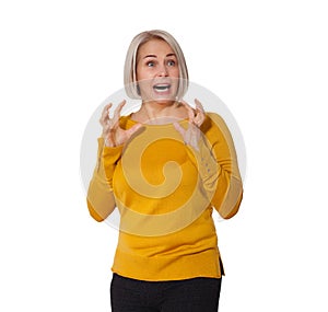 Attractive Middle Aged Woman expresses fear and horror, panic and cry, hysterics and problem, surprise and fright. Woman