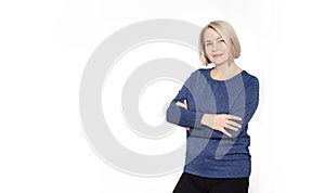 Attractive middle aged woman with folded arms on white background