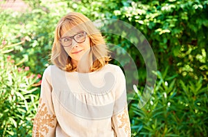 Attractive middle aged woman outdoor portrait