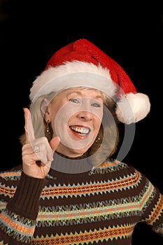 Attractive middle-aged woman in Santa Hat