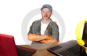 Attractive millennial business man working with laptop computer as internet blogger and technology geek in online successful job a