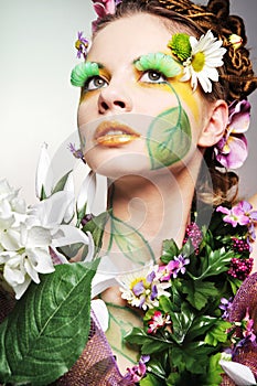 Attractive model posing as Spring Lady.