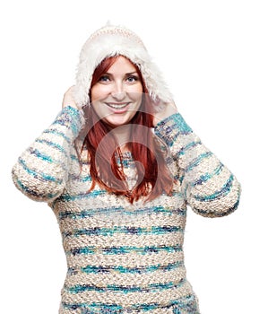 Attractive model wearing winter hat and pullover