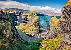 Attractive morning view of small fishing village at the foot of Mt. Stapafell - Arnarstapi or Stapi. photo