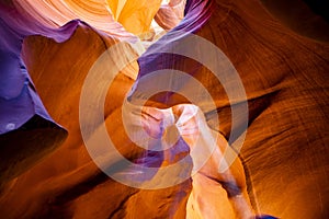 An attractive natural landscape for tourists in the Lower Antelope Canyon in Page Arizona with bright sandstones stacked in flaky