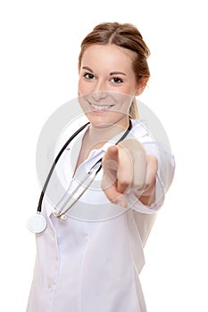 Attractive nurse pointing with finger