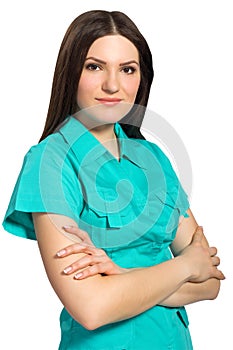 Attractive nurse in uniform with arm folded