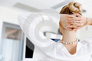 Attractive office worker sitting at desk