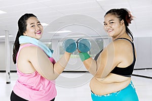 Attractive overweight women doing exercise