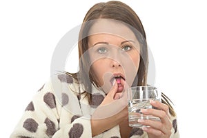 Attractive Poorly Unwell Young Woman Feeling Sick and Ill Taking Medicine