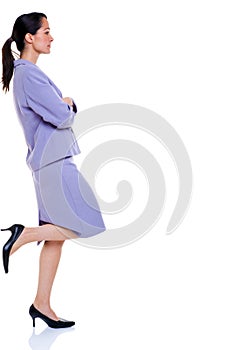 Attractive professional business woman leaning