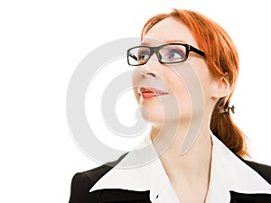 Attractive red-haired business woman in glasses