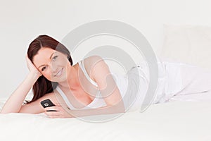 Attractive red-haired female relaxing