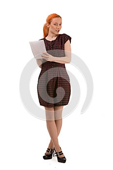 Attractive redhead woman writing notes