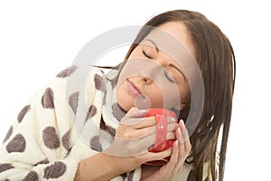 Attractive Relaxed Tired Cosy Young Woman Holding A Cup Of Tea