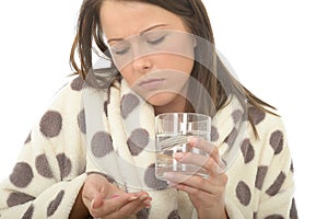 Attractive Relaxed Young Woman Feeling Poorly and Unwell Taking Medicine