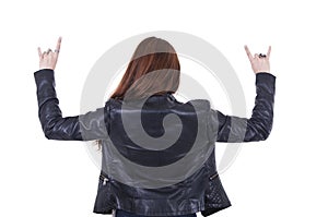 Attractive rocker girl wearing leather jacket and