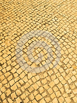 Attractive, rough, yellow paving setts