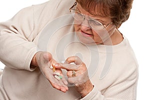 Attractive Senior Woman and Medication Pills