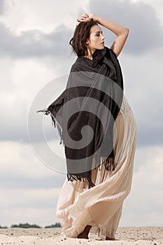 Attractive and sensuality woman in the desert photo