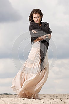 Attractive and sensuality woman in the desert