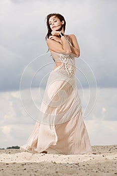 Attractive and sensuality woman in the desert