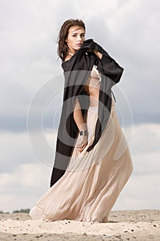 Attractive and sensuality woman in the desert