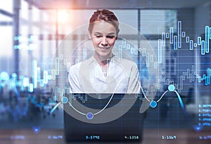 Attractive smiling business woman or stock trader analyzing stock graph chart using laptop, Portrait front view businesswoman. Buy