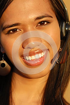 Attractive smiling telephone technical support wom