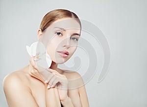 Attractive spa woman portrait. Smiling girl with healthy skin