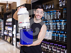 salesman demostration different sport nutrition photo