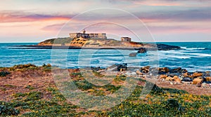 Attractive spring view of southernmost point of Sicily with Correnti island, Italy, Europe. Stunning sunrise on Mediterranean sea.