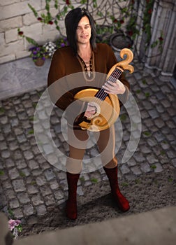 Attractive streetlife entertainer Troubadour playing a guitar for his love