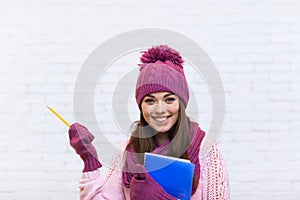 Attractive Student Girl Hand Gesture To Copy Space Smile In Pink Hat Holding Folder Pencil