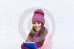 Attractive Student Smile Teenage Girl In Pink Hat Holding Folder Pencil