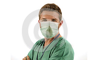 attractive and successful medicine doctor or nurse man posing confident for hospital staff corporate portrait  in green medical