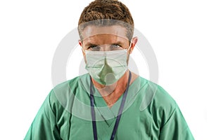 attractive and successful medicine doctor or nurse man posing confident for hospital staff corporate portrait  in green medical