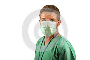 attractive and successful medicine doctor or nurse man posing confident for hospital staff corporate portrait  in green medical