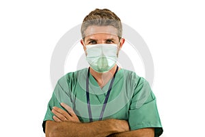 attractive and successful medicine doctor or nurse man posing confident for hospital staff corporate portrait  in green medical
