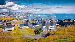 Attractive summer sityscape of Torshavn town. Impressive morning scene of Streymoy island, Faroe