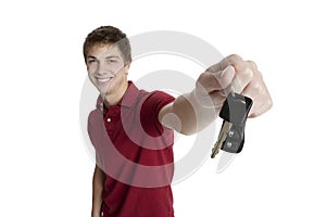 Attractive teenage boy holding car keys